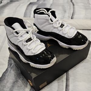 Jordan Air 11 Retro White, Black and Metallic Gold Sneakers